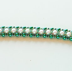 Green and white beaded bracelet