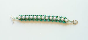 Green and white beaded bracelet